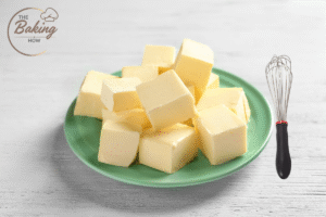 Cubes of butter with a whisk for creaming in cookie recipes