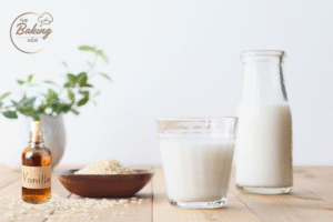 Vanilla extract bottle and milk jug as flavoring ingredients for cookies