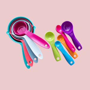 "Colorful measuring spoons for baking conversions and recipe measurements"