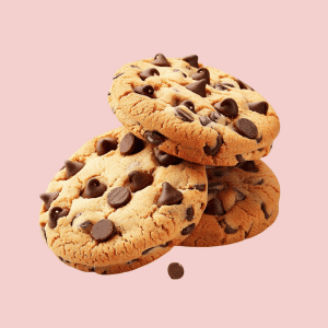 Freshly baked chocolate chip cookies stacked on pink background"
