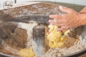 Softening dry cookie dough with melted butter after chilling