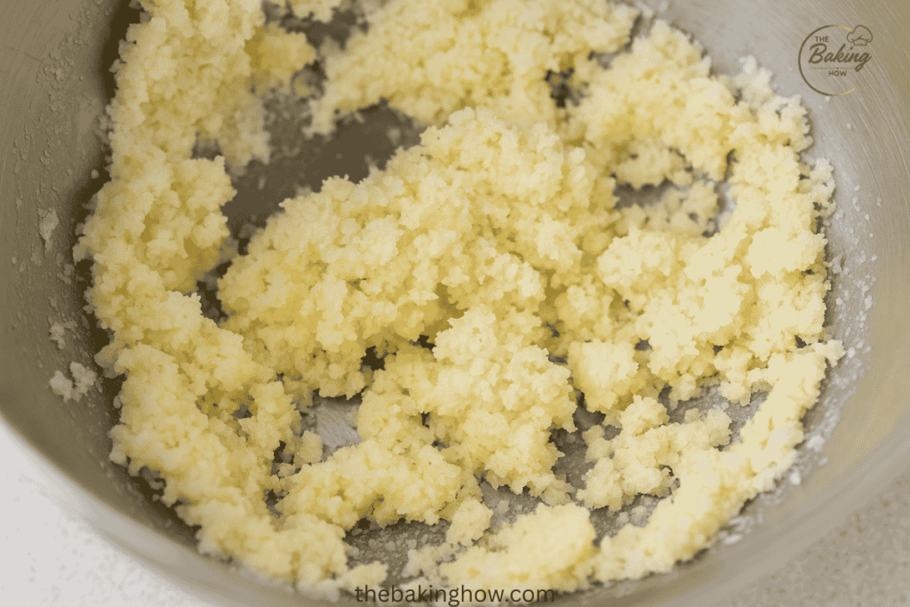 Under-creamed butter and sugar mixture looking grainy and uneven.